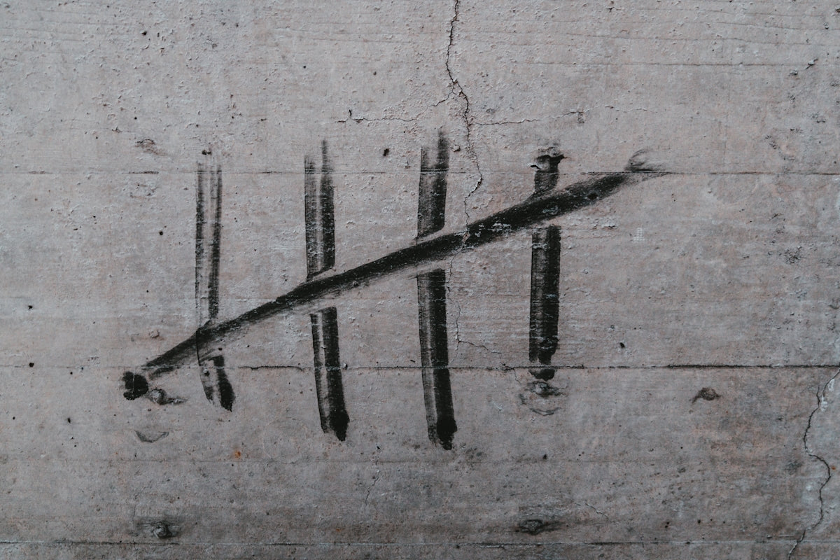 a piece of concrete with a line drawn on it